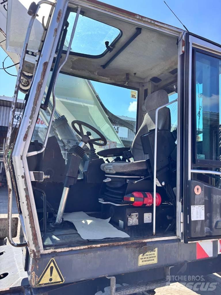 Fuchs MHL 320 Stroje pro manipulaci s odpadem