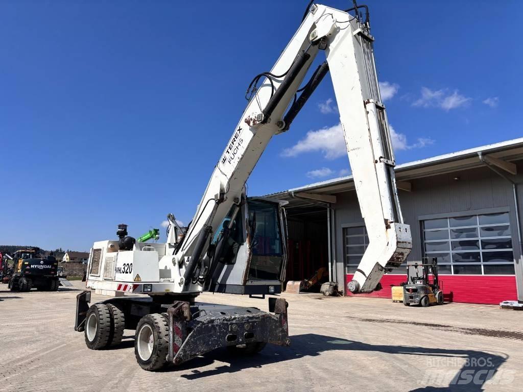 Fuchs MHL 320 Stroje pro manipulaci s odpadem