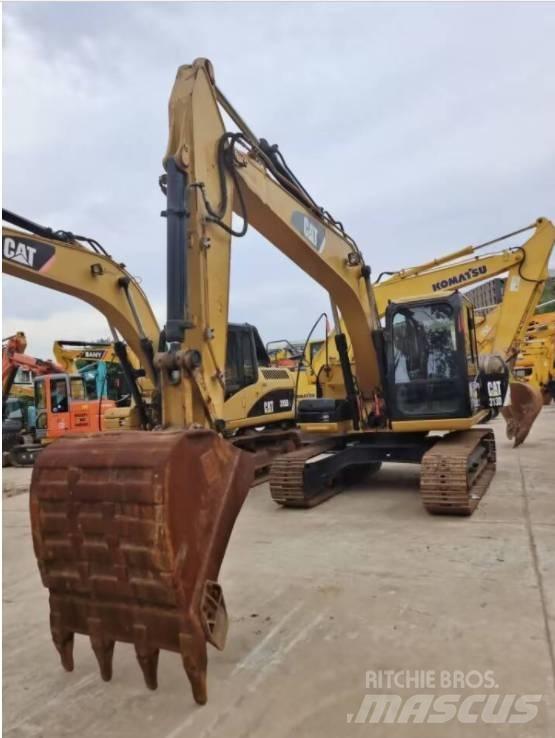 CAT 313 D Pásová rýpadla