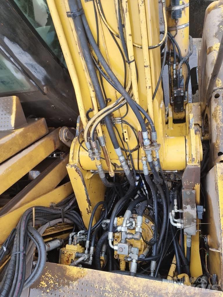 CAT M 325 D L MH Stroje pro manipulaci s odpadem