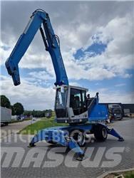 Fuchs MHL 331 Stroje pro manipulaci s odpadem