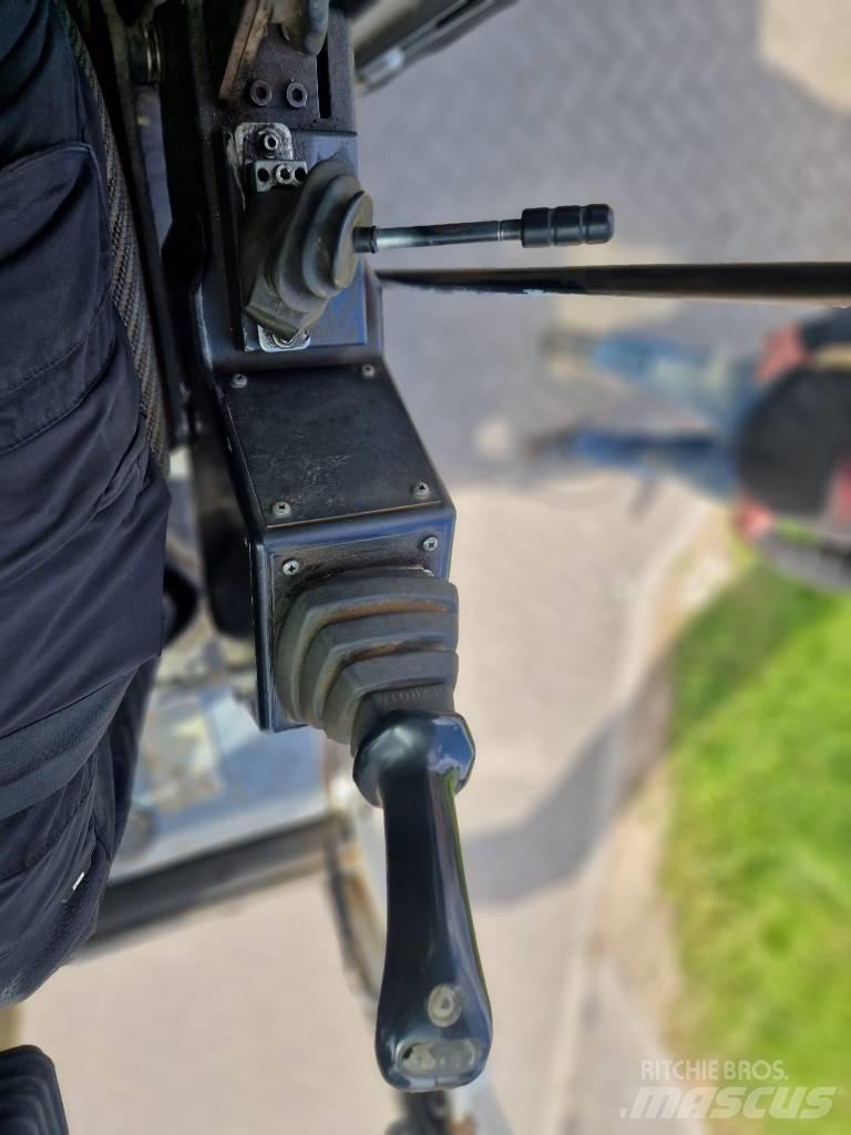 Fuchs MHL 331 Stroje pro manipulaci s odpadem