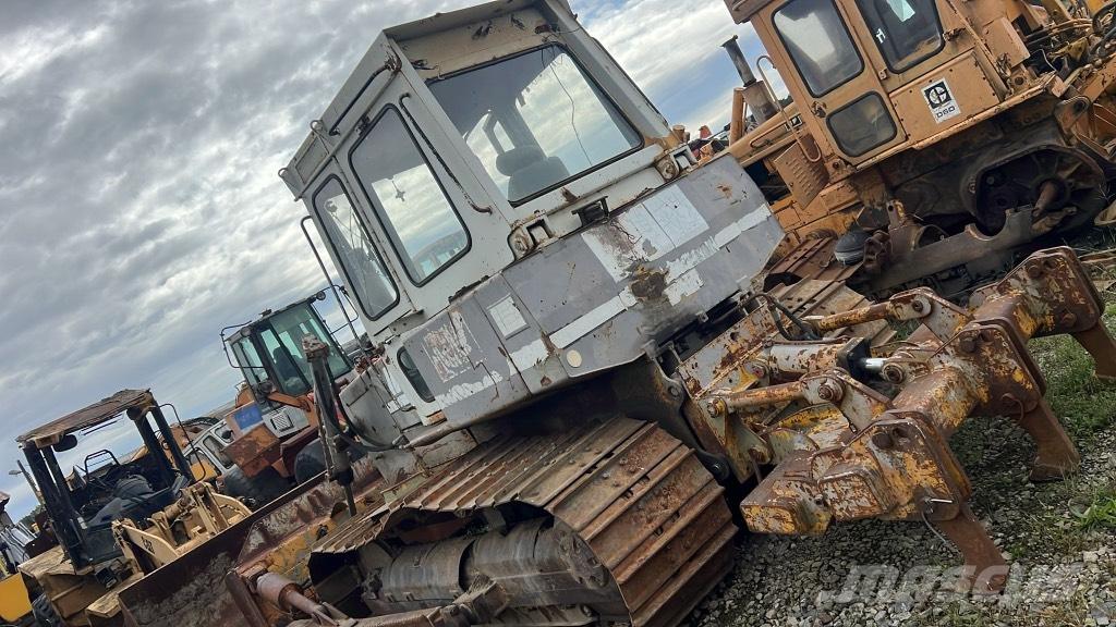 Liebherr PR 711 M Pásy, řetězy a podvozek