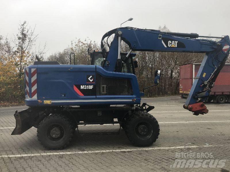 CAT M318F Kolová rýpadla