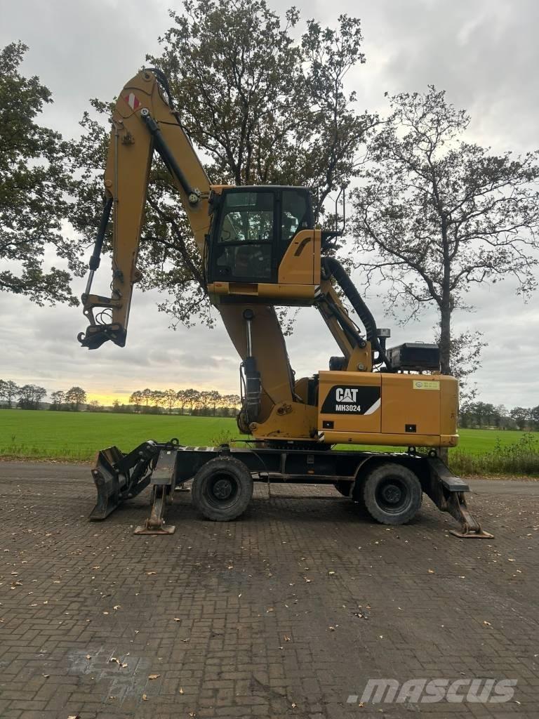 CAT MH 3024 Stroje pro manipulaci s odpadem