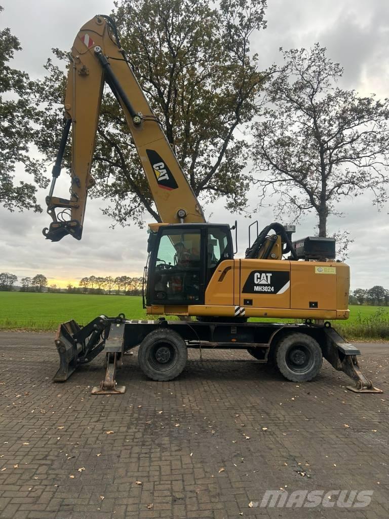 CAT MH 3024 Stroje pro manipulaci s odpadem
