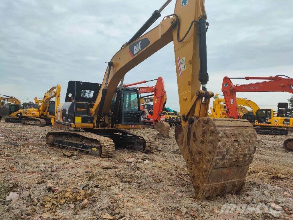 CAT 326D Pásová rýpadla