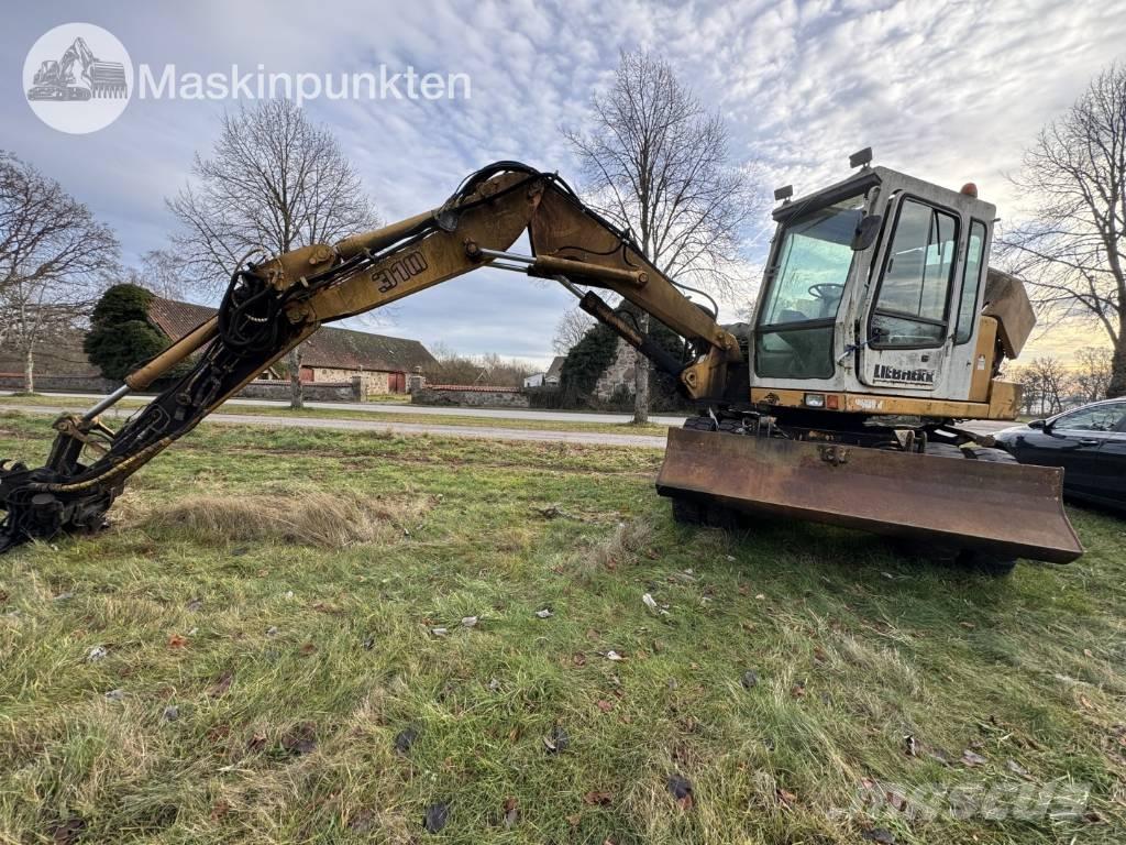 Liebherr A 310 B Kolová rýpadla