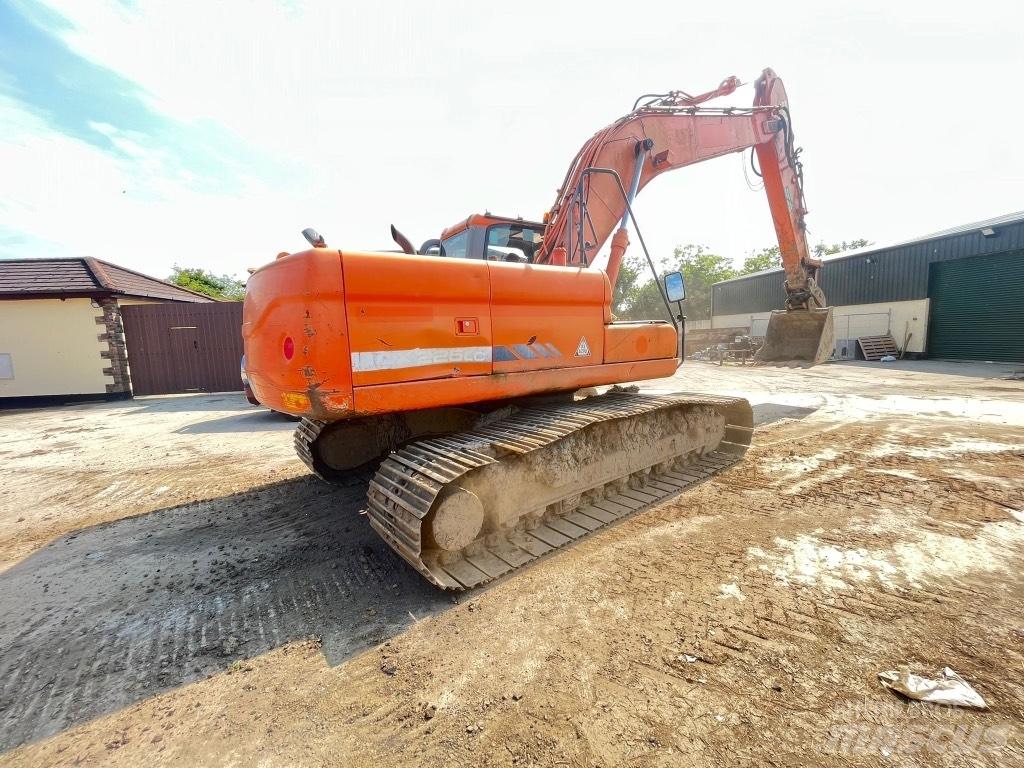 Doosan DX225 Kolová rýpadla