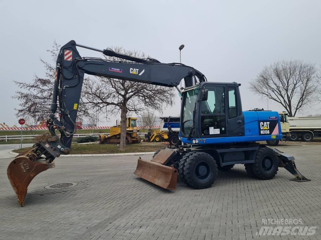 CAT M315D 2 buckets Kolová rýpadla
