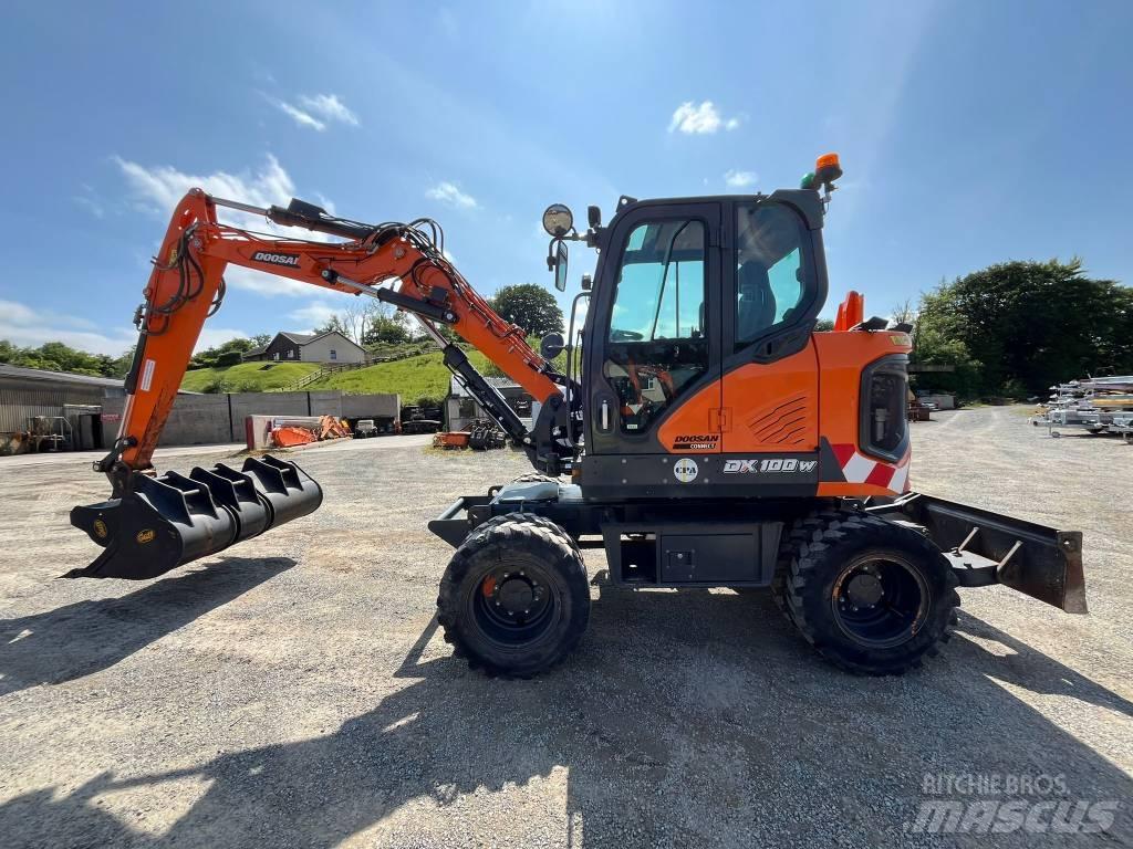 Develon DX 100 W-7 Kolová rýpadla
