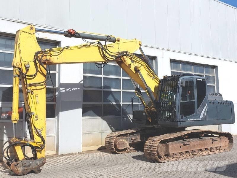 New Holland E 265 C Pásová rýpadla