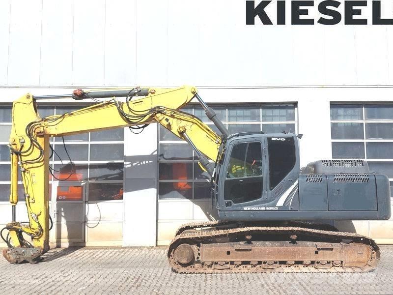 New Holland E 265 C Pásová rýpadla