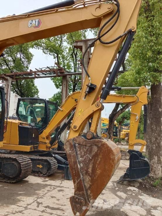 CAT 310 Pásová rýpadla
