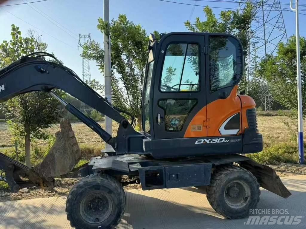 Doosan DX60W Kolová rýpadla