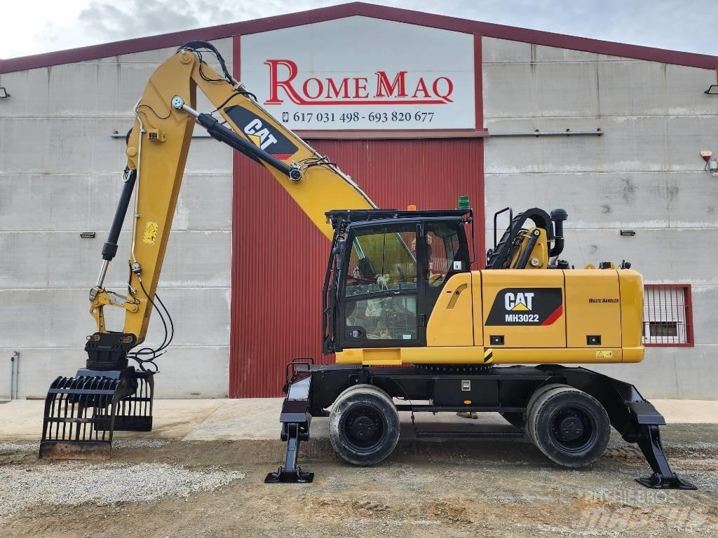 CAT MH3022 Stroje pro manipulaci s odpadem
