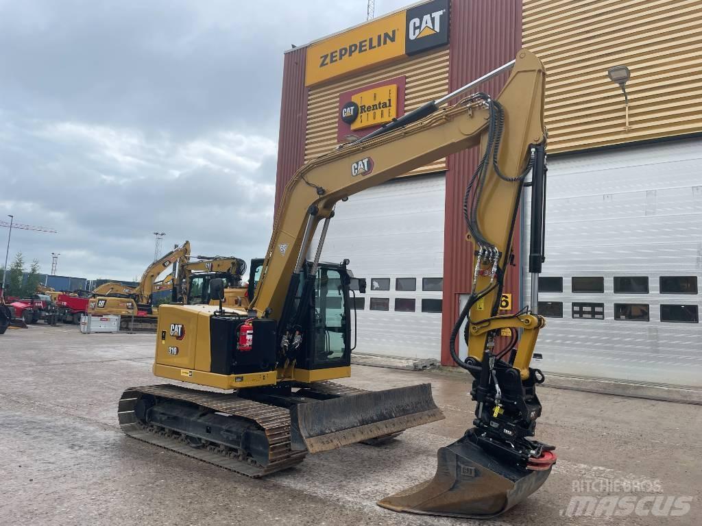 CAT 310 Pásová rýpadla