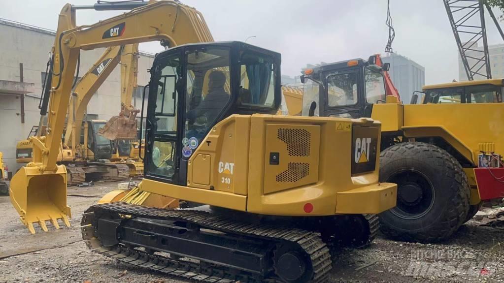 CAT 310 Pásová rýpadla