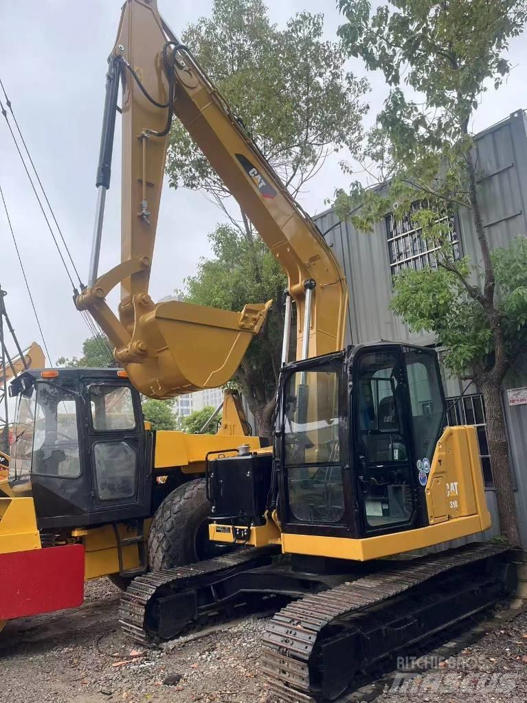 CAT 310 Pásová rýpadla