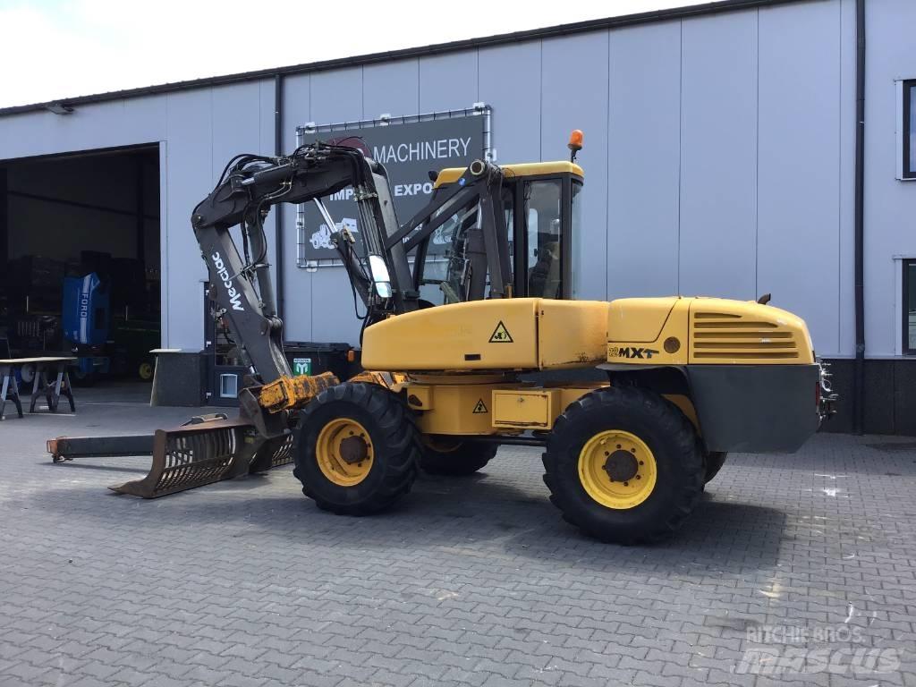 Mecalac 12 MXT Kolová rýpadla
