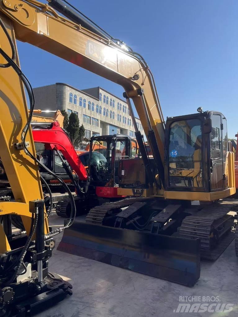 CAT 310 Pásová rýpadla