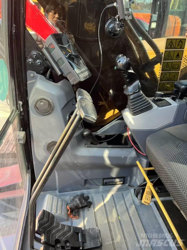 CAT 310 Pásová rýpadla