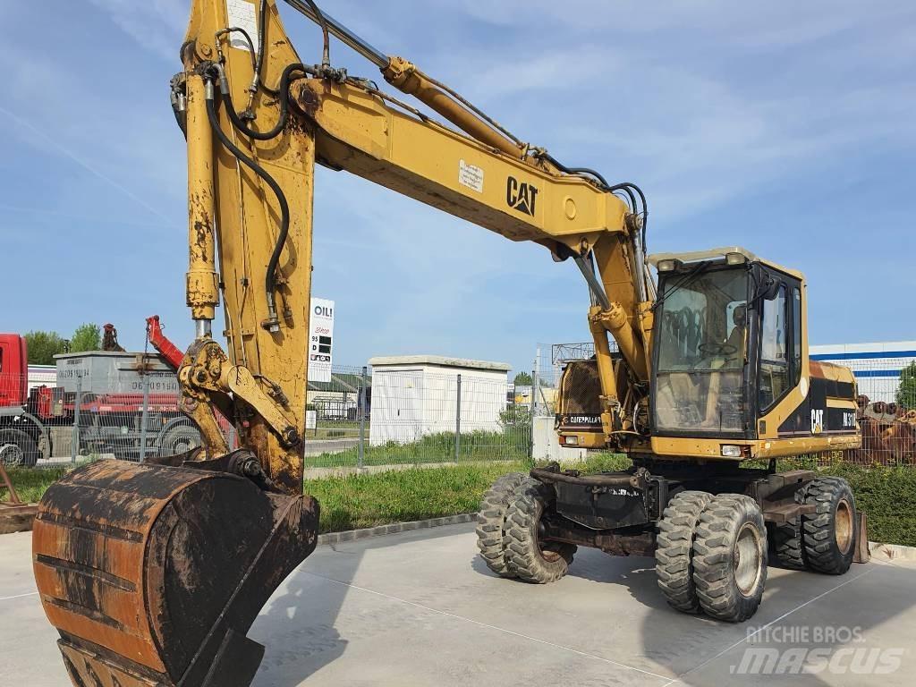 CAT M 318 Kolová rýpadla