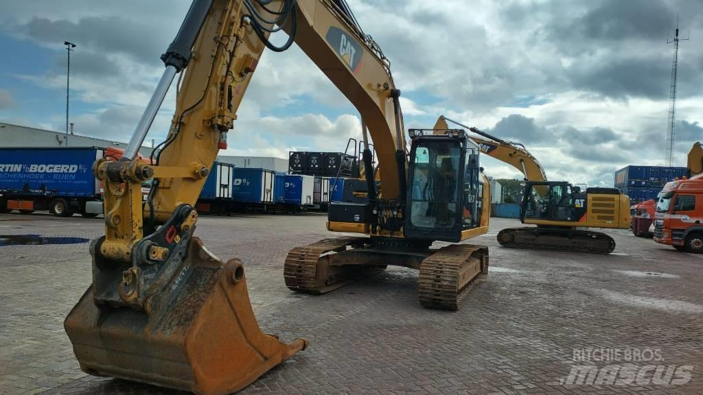CAT 323 EL Pásová rýpadla