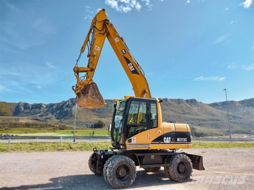CAT M 313 C Kolová rýpadla