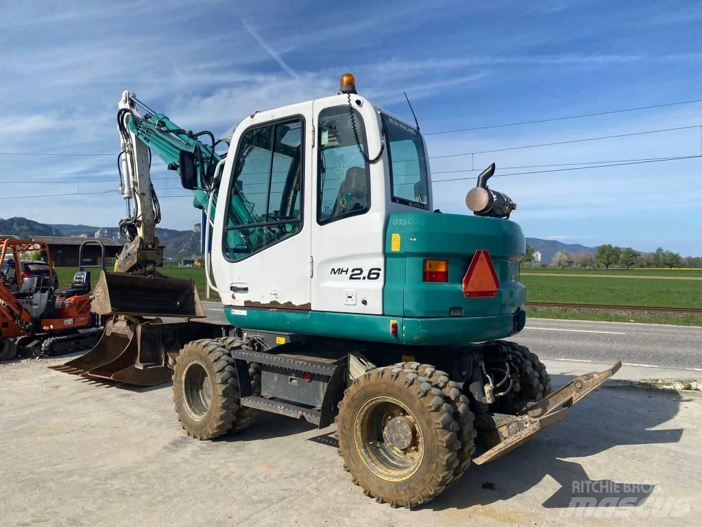 New Holland MH 2.6 Kolová rýpadla