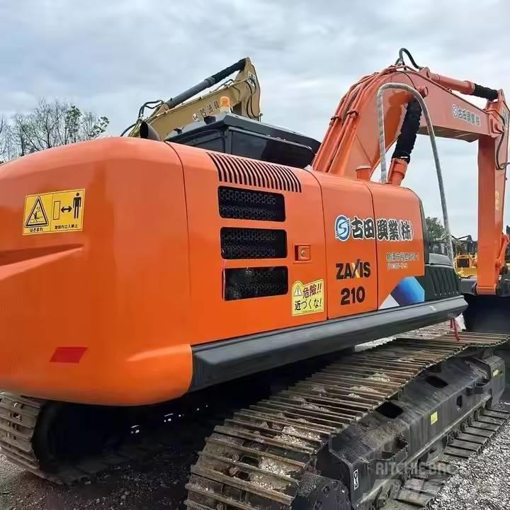 Hitachi ZX210 Pásová rýpadla