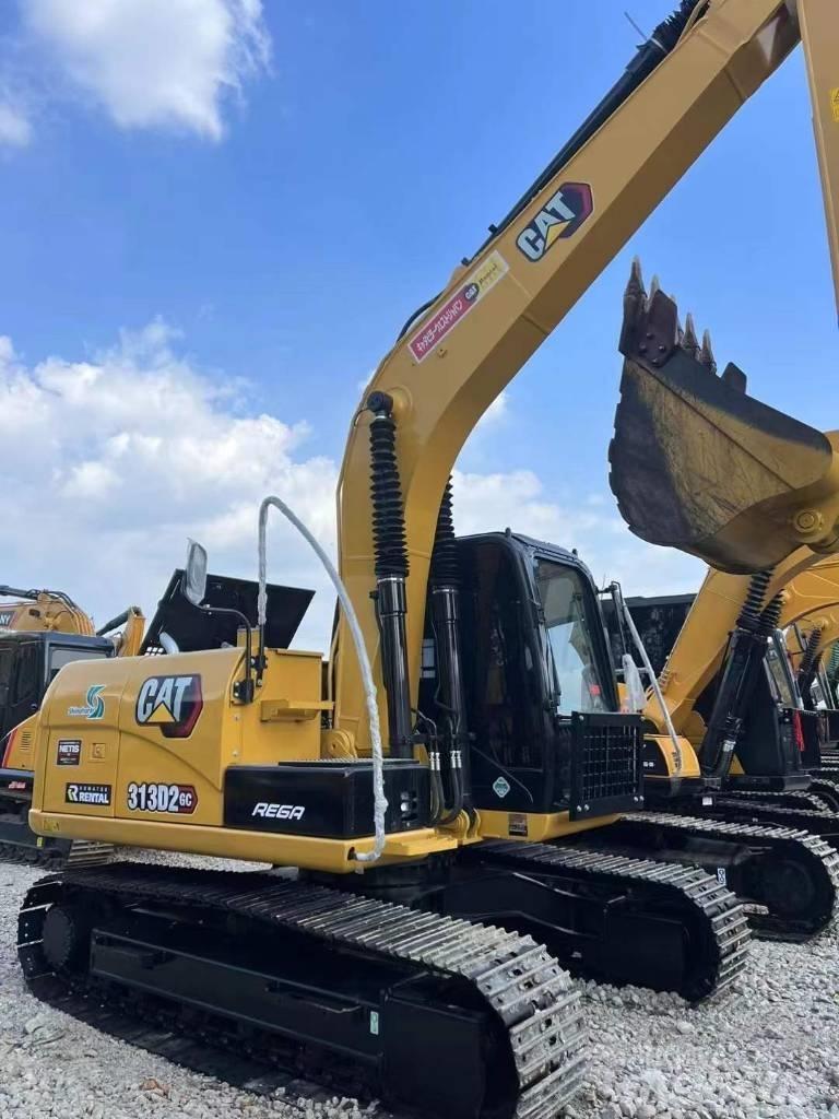 CAT 313 Pásová rýpadla