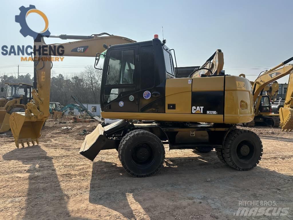 CAT M 320 D Kolová rýpadla