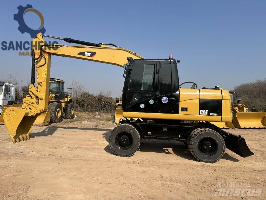 CAT M 320 D2 Kolová rýpadla
