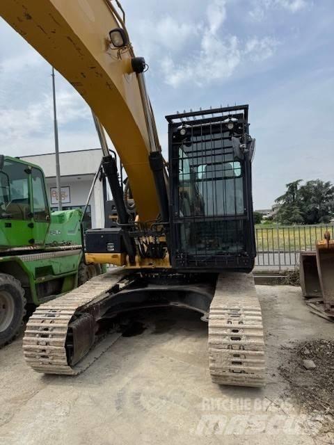 CAT 323 E Pásová rýpadla