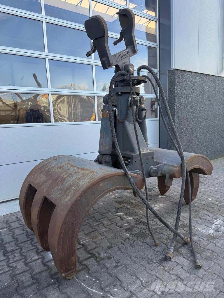 O&K KXSU.20 Klešťové drapáky