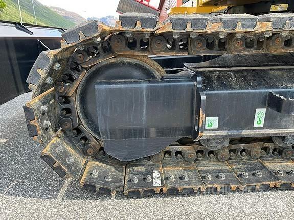 CAT 310 Pásová rýpadla
