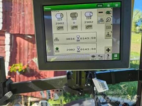 John Deere C441R Lis na válcové balíky