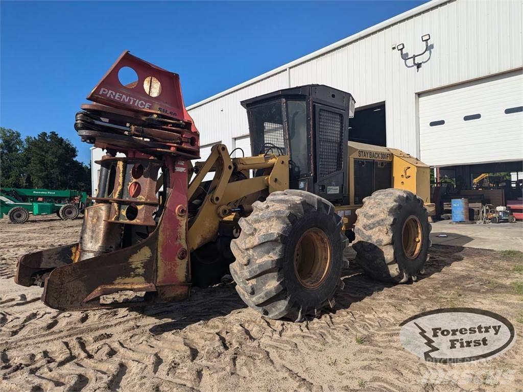 CAT 553 Kácecí harvestory