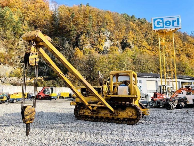 CAT 583H Pokladače potrubí