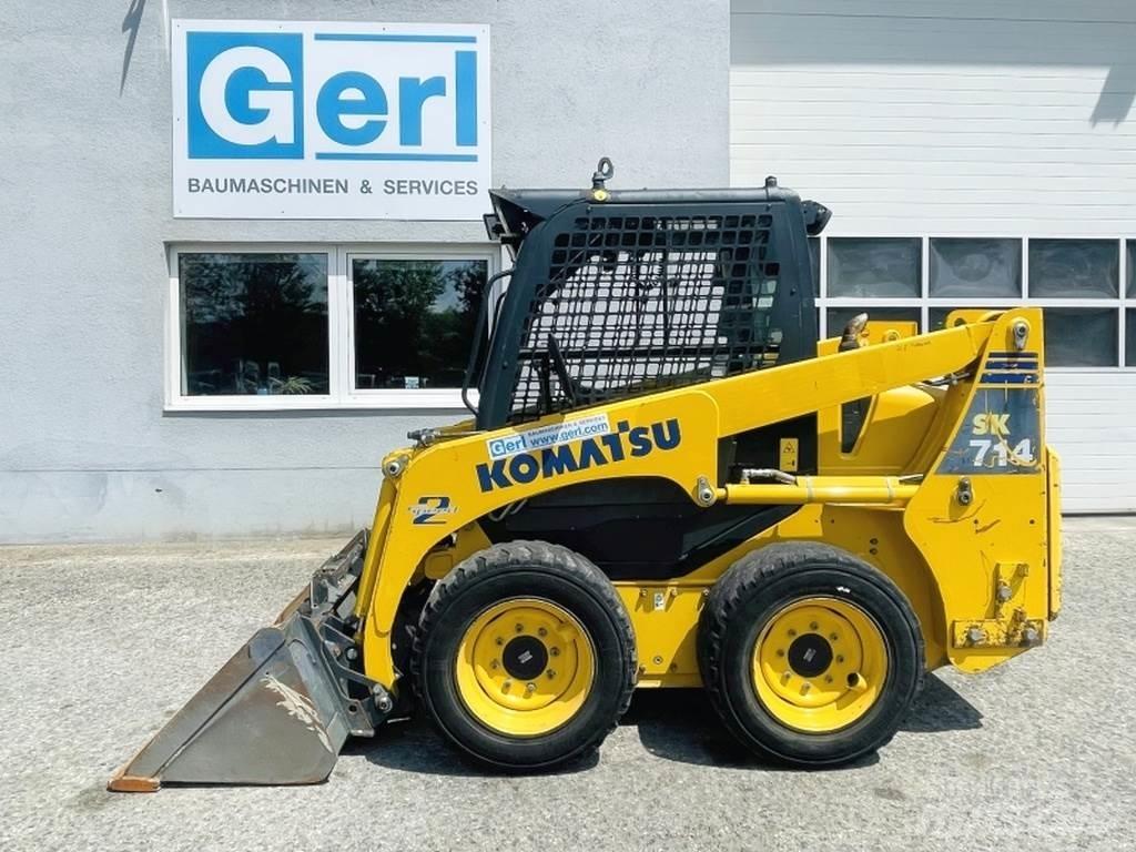 Komatsu SK714 Smykem řízené nakladače