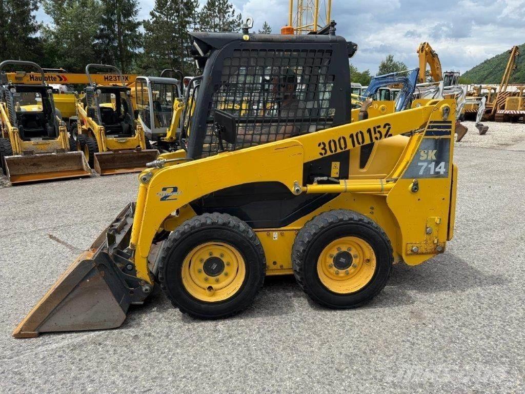 Komatsu SK714-5 Smykem řízené nakladače