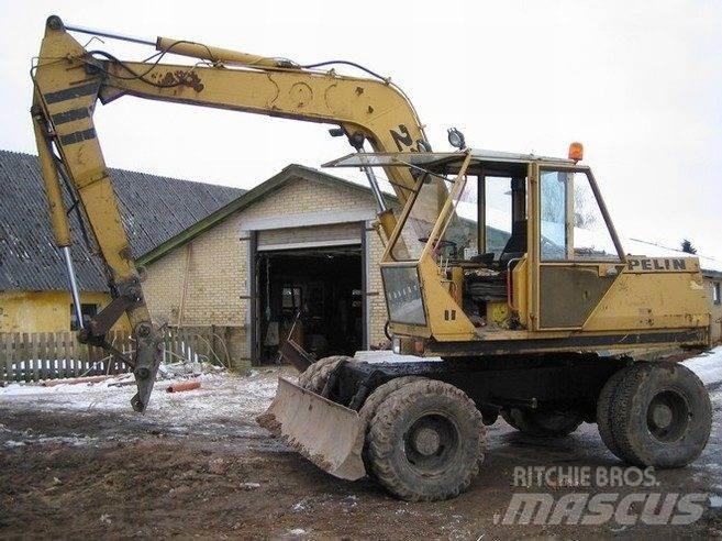 CAT 212 til ophug Pásová rýpadla