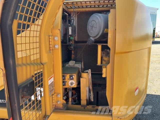 CAT 311D Pásová rýpadla