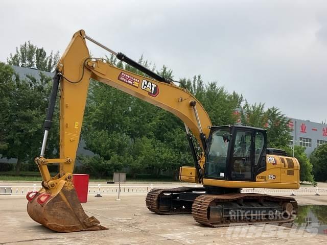 CAT 323GX Pásová rýpadla