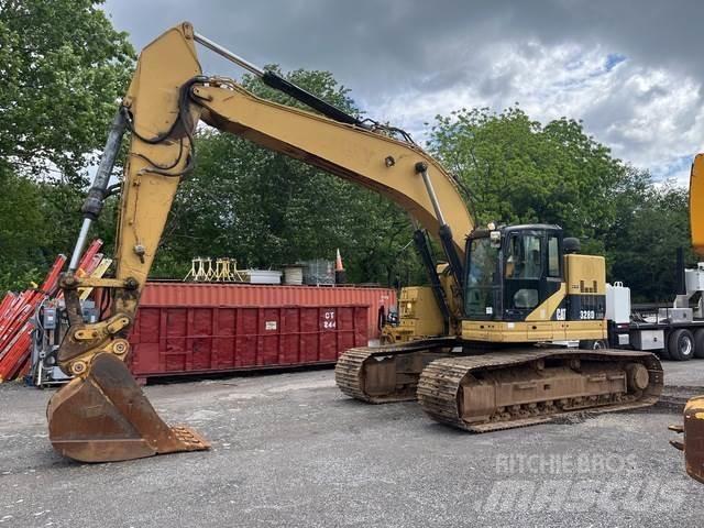 CAT 328 Pásová rýpadla