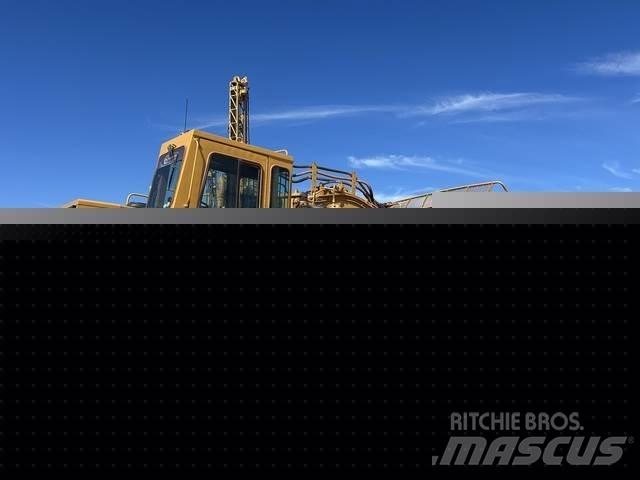 CAT 633E Skrejpry