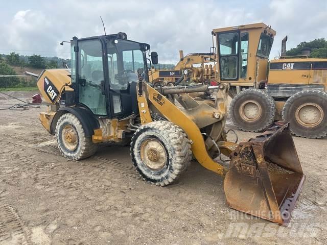 CAT 906H Kolové nakladače