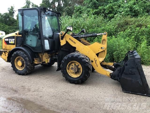 CAT 906M Kolové nakladače