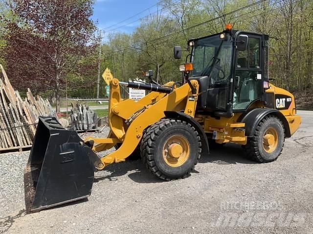 CAT 907H Kolové nakladače